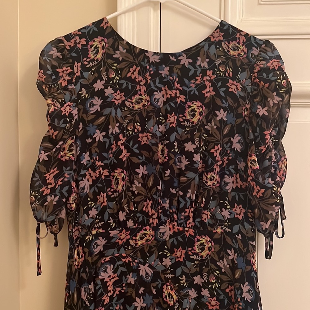 CeCe black floral dress with rouched sleeves and tiered skirt